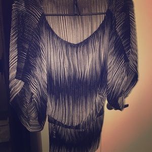 Loose/ fitted waist top